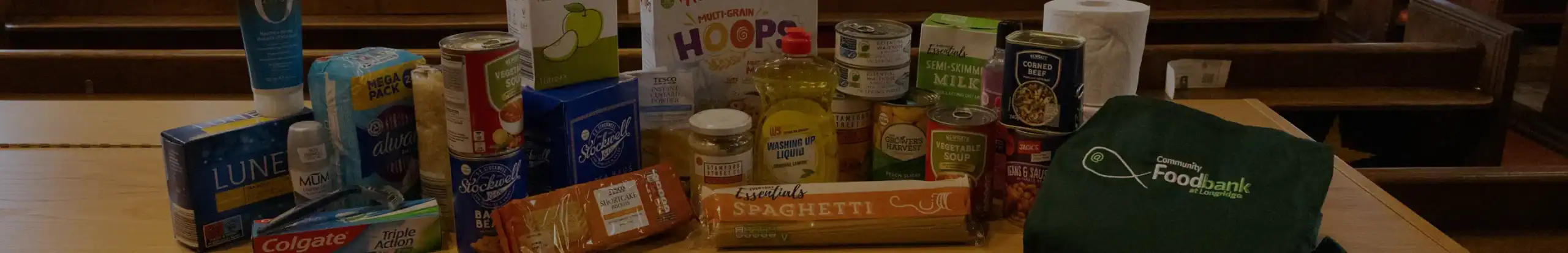 Collection of food items and supplies for Longridge Food Bank donation drive.